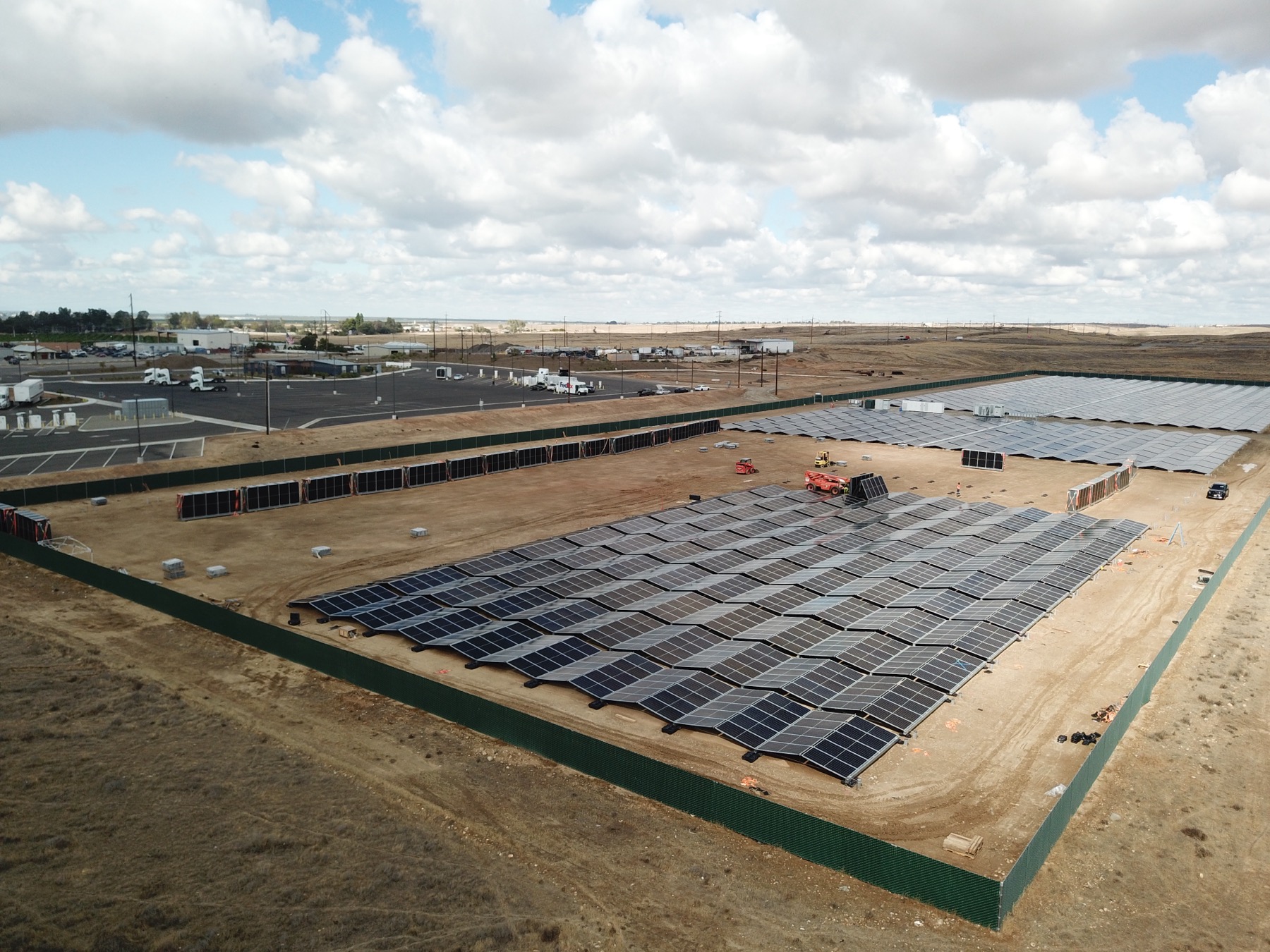 Aerial view of solar arrays and site infrastructure in Bakersfield.
