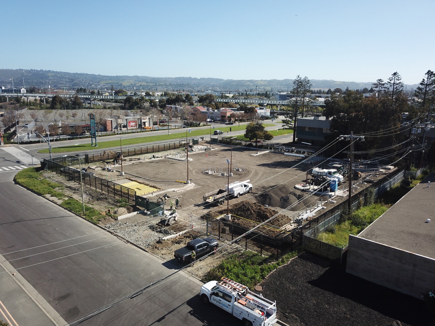 Oakland construction site during civil work, with equipment and site foundations visible.